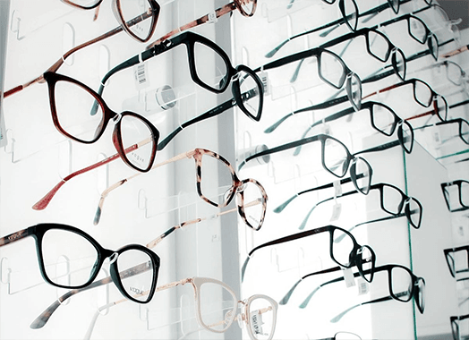 Spectacle frames displayed on the wall of the optical shop